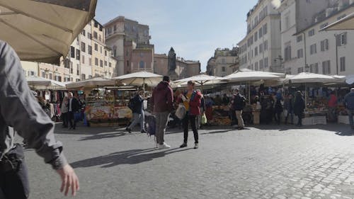 Tourist Taking Picture on a Street Market