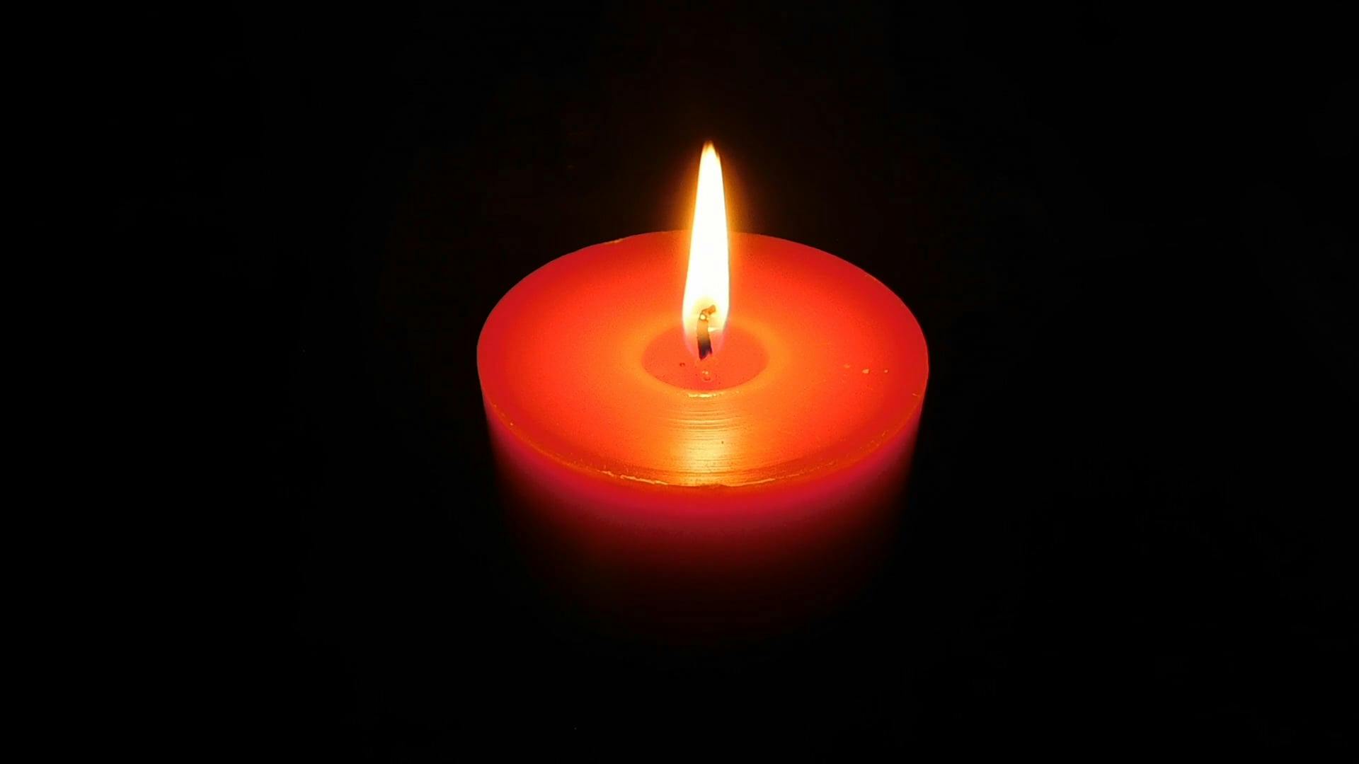 A Lit Candle in the Dark Free Stock Video Footage, RoyaltyFree 4K & HD