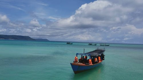 Boats in the Middle of the Ocean