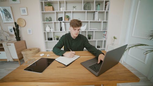 Young Man Working on a Laptop