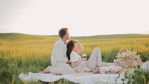 Couple Having a Picnic Outdoors