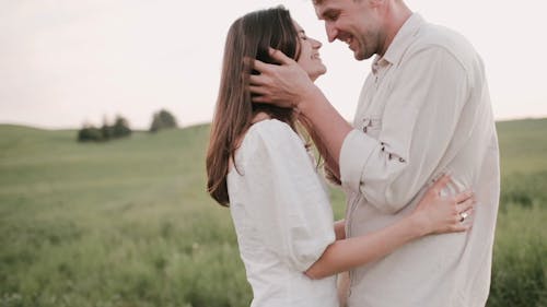 Shallow Focus of Couple Kissing and Hugging