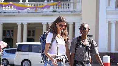 two female tourists walking in the city