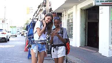 a woman using her smartphone for directions