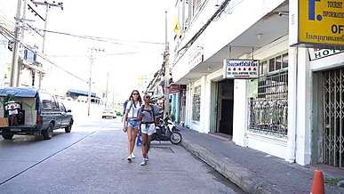 two female tourists finding the tourist information office