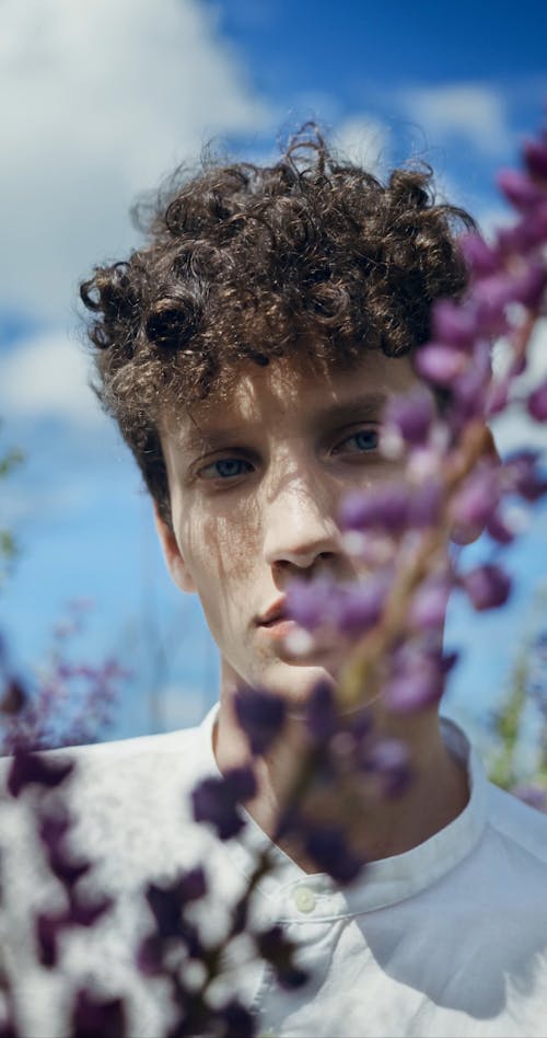 A Young Man In The Flower Field