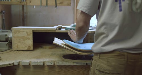 Man Making a Skateboard