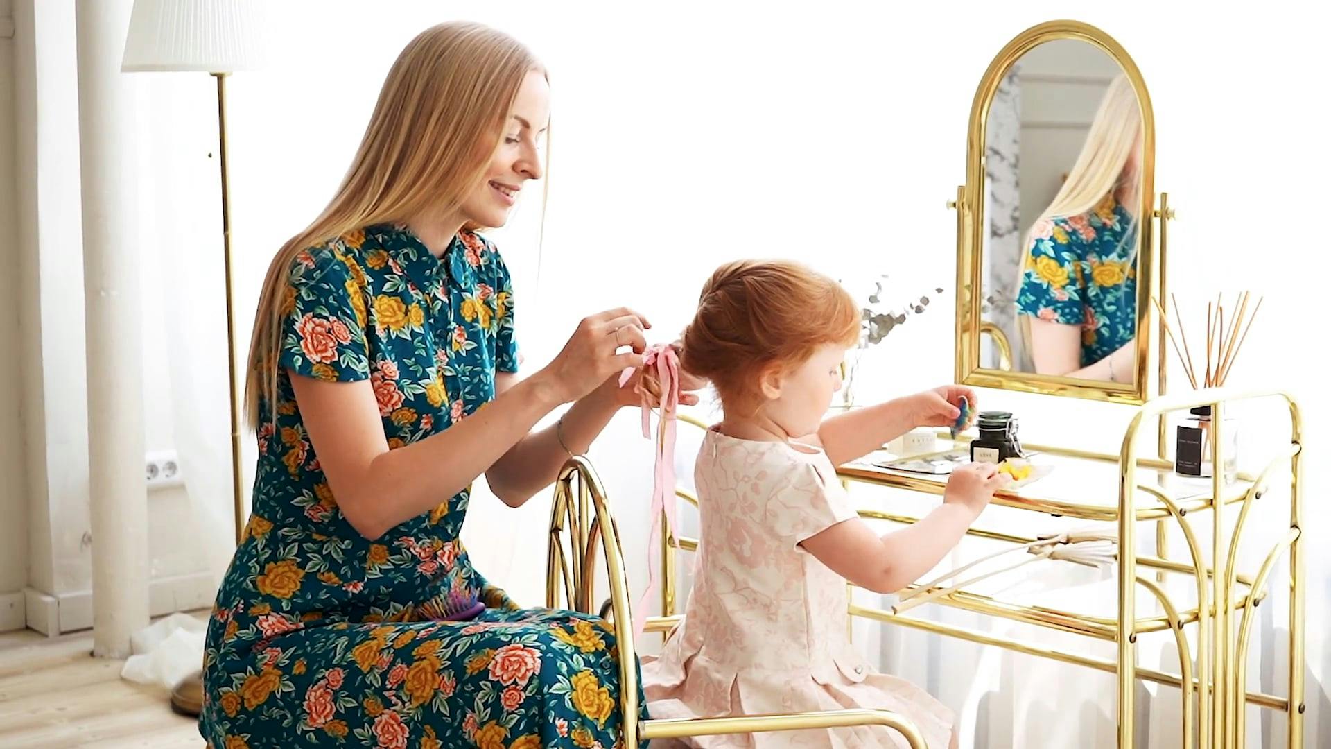 Mother Tying Her Daughter's Hair · Free Stock Video