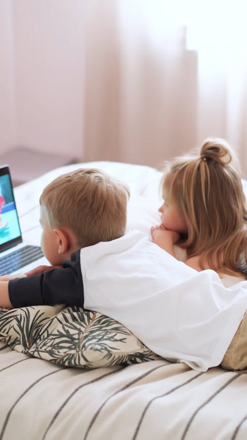 Kids Watching Cartoons On A laptop