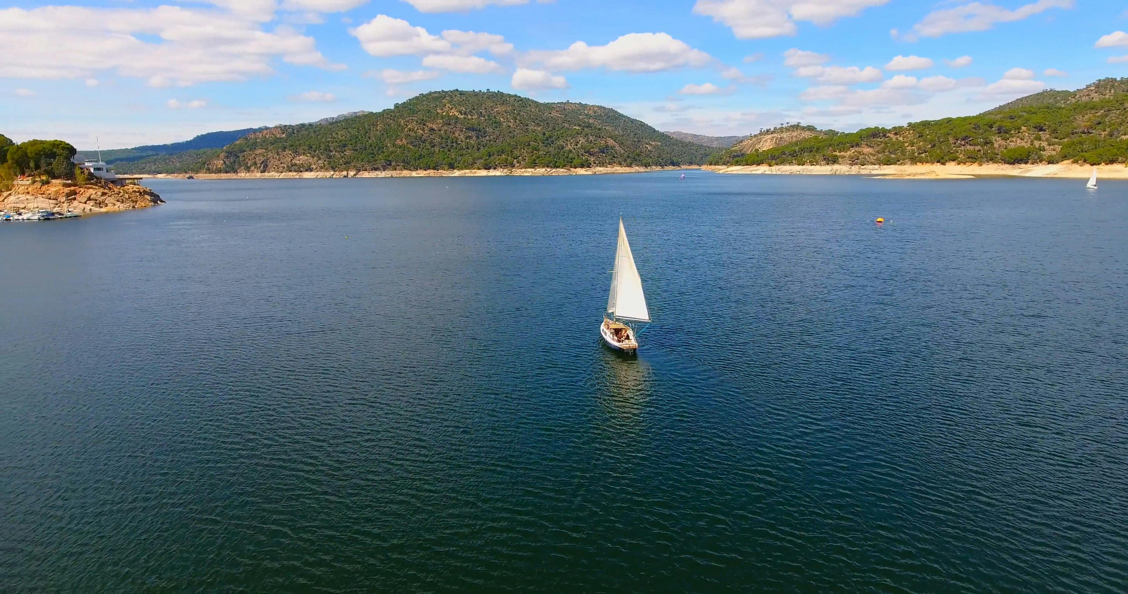 A Sail Boat Sailing In The Lake · Free Stock Video