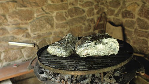 Person Cooking on a Griller