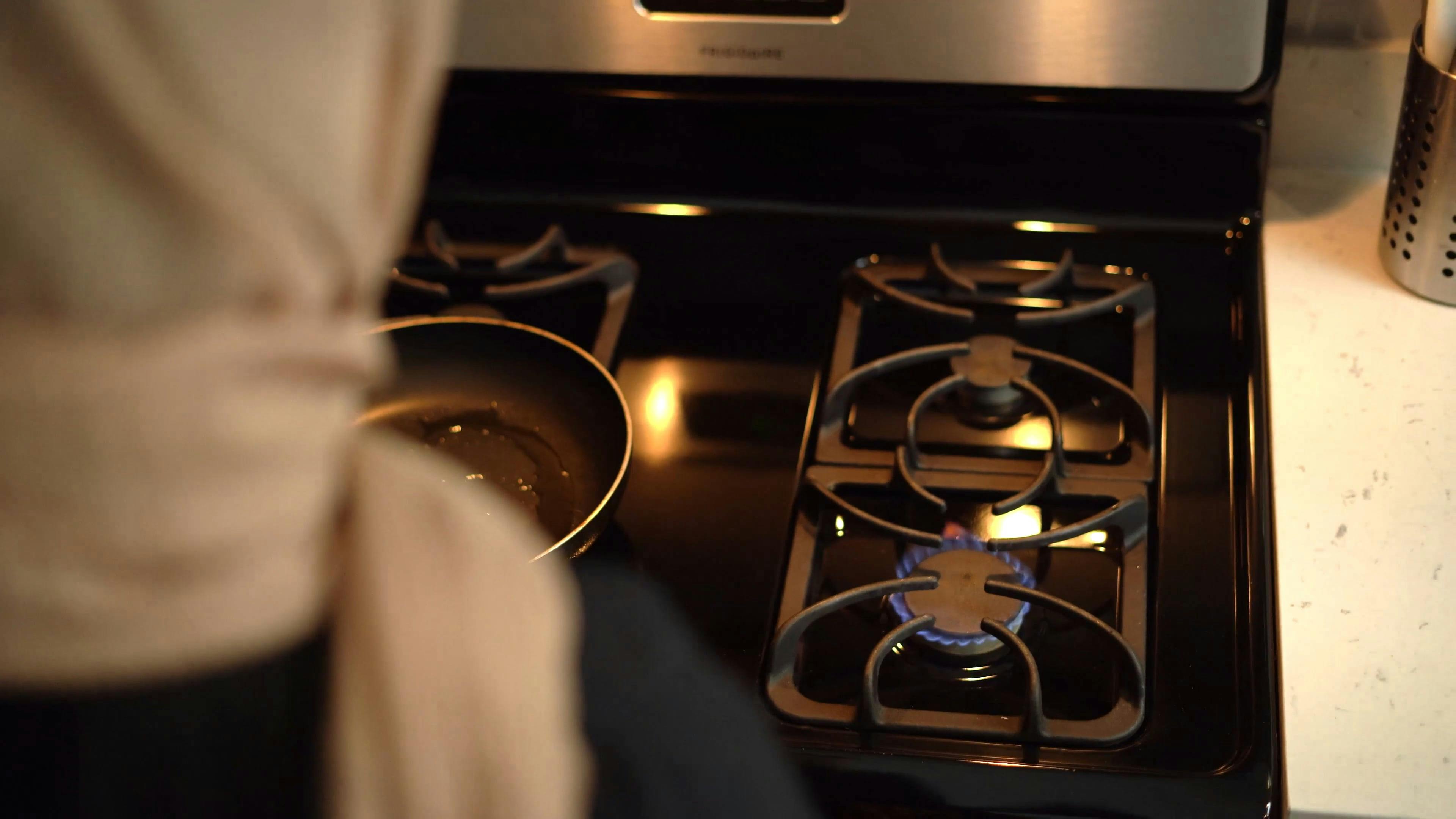 Person Pouring Cooking Oil on a Pan · Free Stock Video