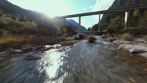 Drone Flying Over A Stream Of River