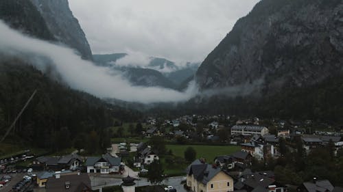 Drone Footage of a Town at the Foot of a Mountain