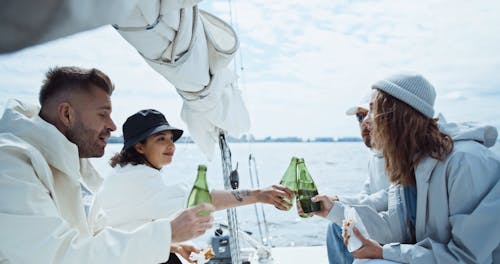 Friends Drinking At a Boat