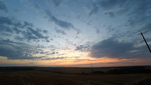 Time Lapse Footage a Sunset at the Farmland