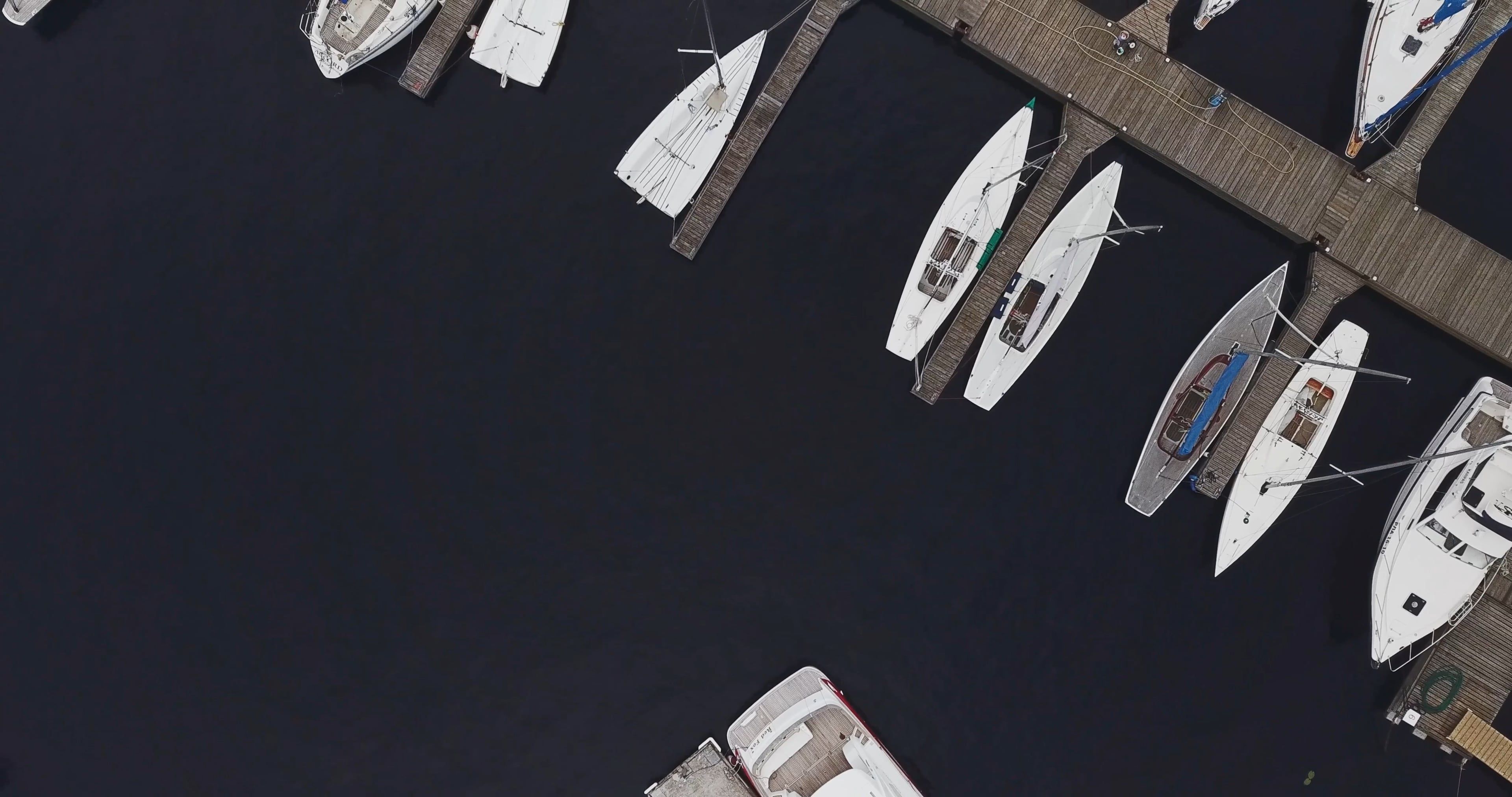 Aerial view of boats docked at a marina Free Stock Video Footage ...