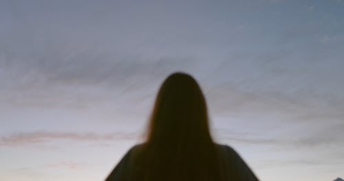 Woman Raising Her Hands