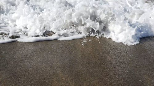 Crashing Waves on the Sand