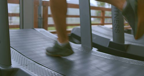 Person Running at the Treadmill