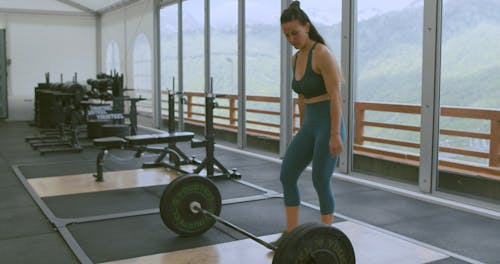 Woman Working Out at the Gym