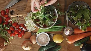 person making salad