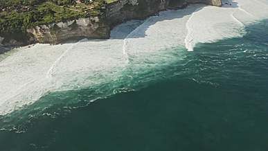 slow motion video of waves crashing on coast