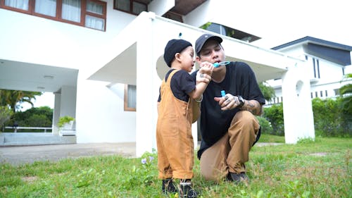 Family Playing Bubbles