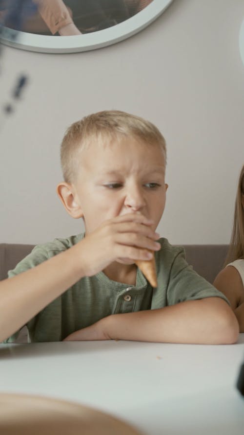 A Little Boy Eating Ice Cream