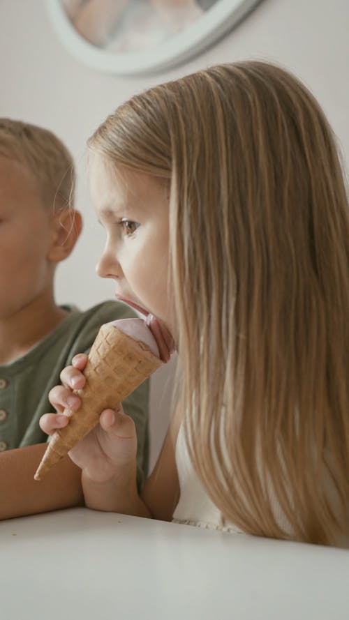 Children Eating Ice Cream and Having Fun