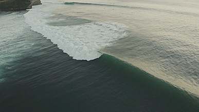 drone footage of beach waves