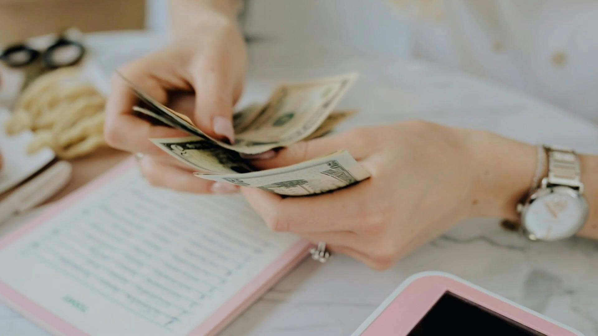 A Man Counting Cash Money And Put It Into Record \u00b7 Free Stock Video