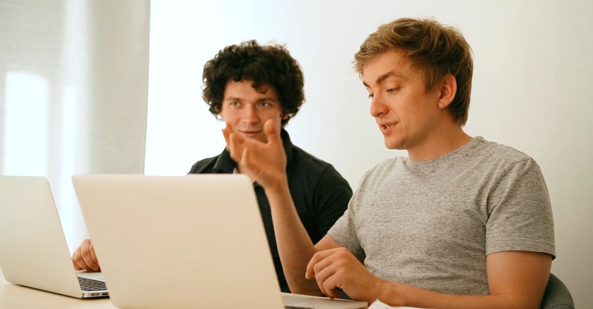 Conversations Computer Men Having Conversation in front of their Laptops Free Stock Video ...