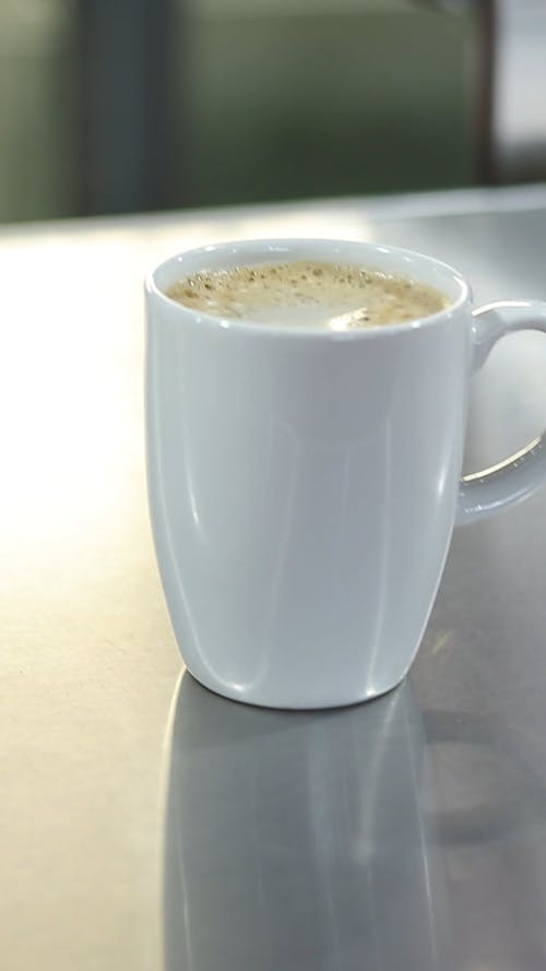 Close-Up View of a Coffee in a Ceramic Mug