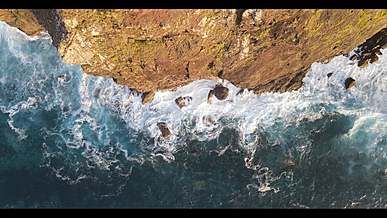 drone footage of a cliff coast