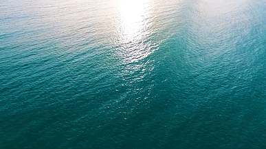 drone footage of a blue ocean