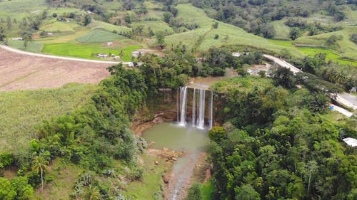 A River Waterfall Cascading Down The Plunge Basin