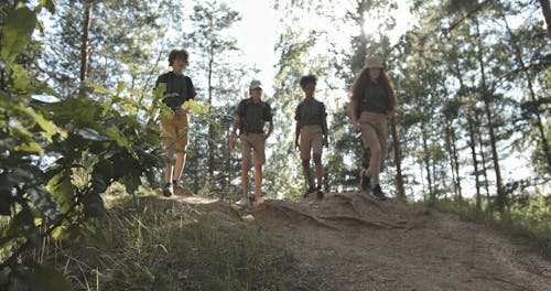 Group of Teenagers Walking in the Woods