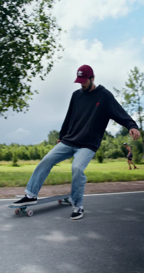 Young Man Doing Tricks On A Skateboard