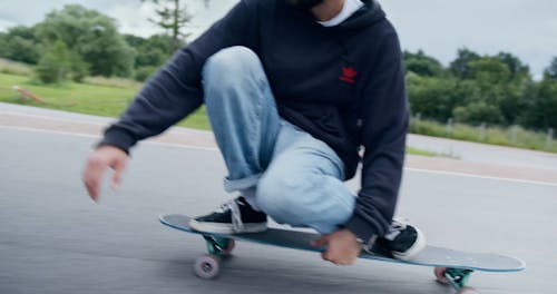 Man Riding On A Skateboard