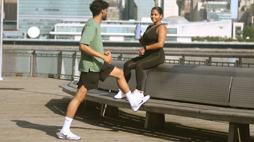 Man and Woman Working Out on the Outdoors