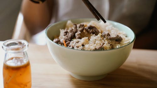 A Serving Of Asian Noodles In A Bowl 