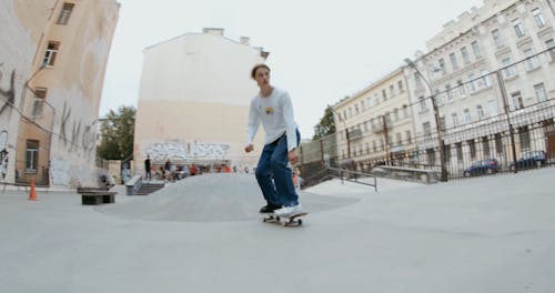 A Skateboarder Doing a Trick