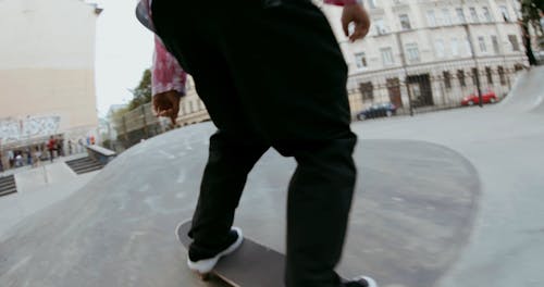 A Skateboarder Failing a Trick