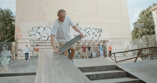 A Skater Grinding His Skateboard