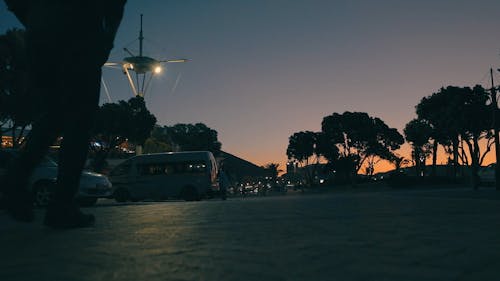 Low-Angle Shot of a Man Walking Alone 