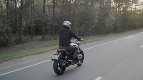 Man Driving A Motorcycle