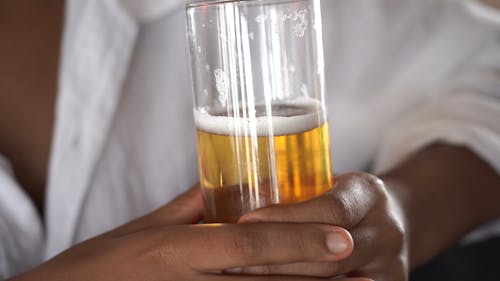 Anonymous Person Holding beer Glass