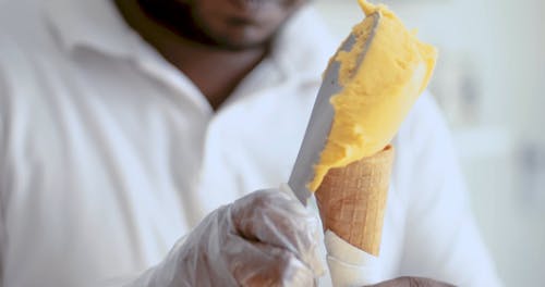 Scooping Ice Cream in Cone