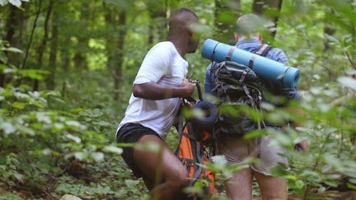 Two Travelers Getting Ready to Hike Again after a Short Break